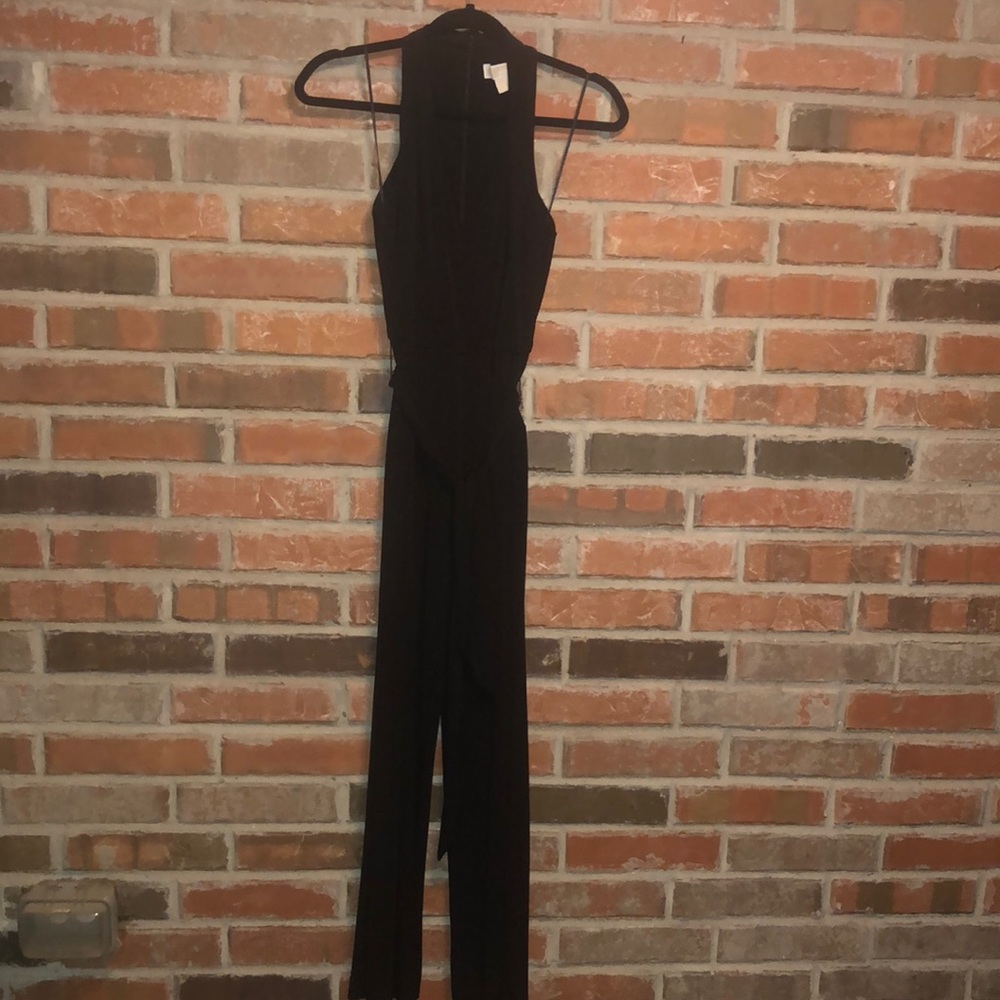 Black sleeveless jersey knit jumpsuit